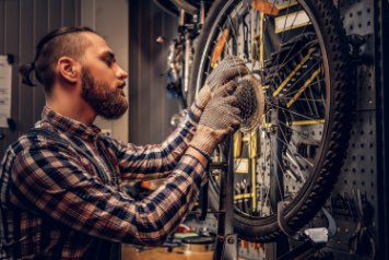 Man repairing bike in Dublin